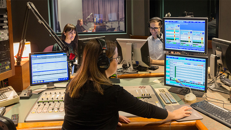 Photo of female staff at radio studio